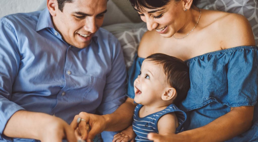 Happy family with child looking for Abilene Electricity.