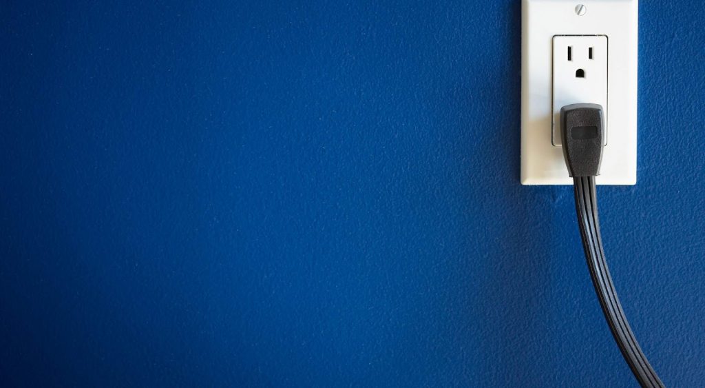 Blue wall and outlet: Abilene Electricity.