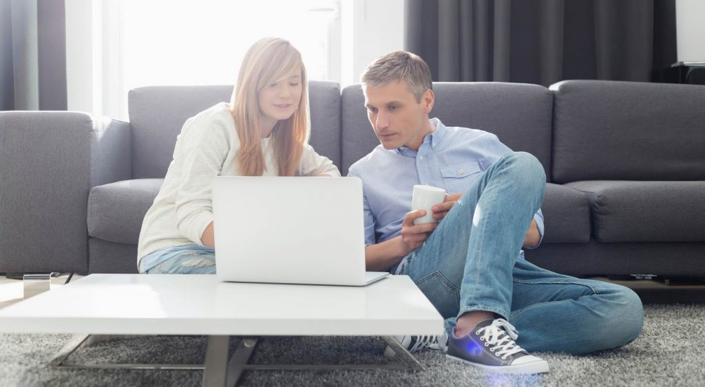 Couple shopping online - Acacia Energy
