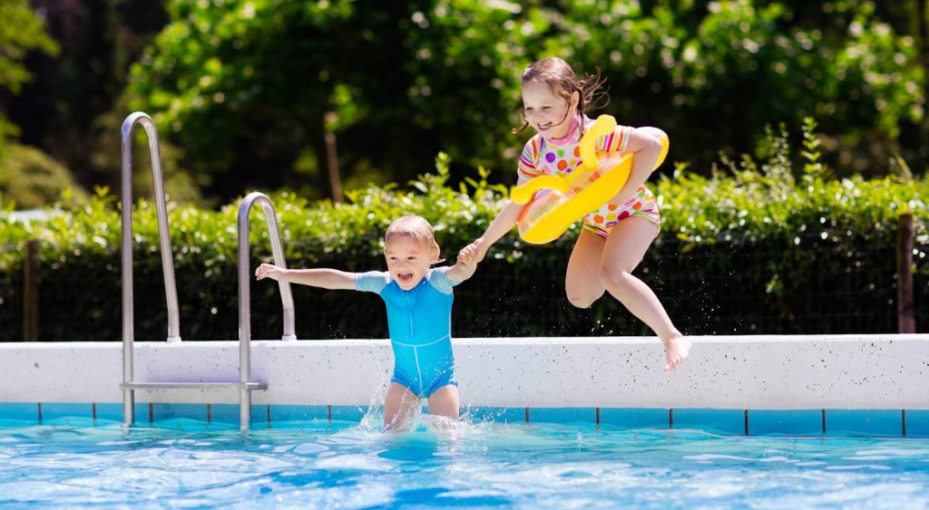 Kids playing pool. Are Electric Rates Higher In Summer Or Winter?