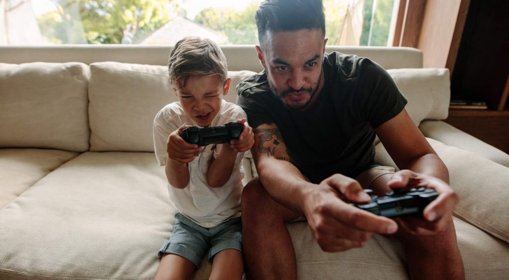 Father and son gaming. Average electric bill by square footage.