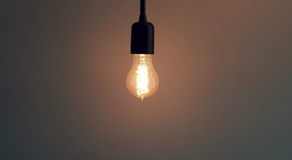 Light bulb. Average electric bill by square footage.