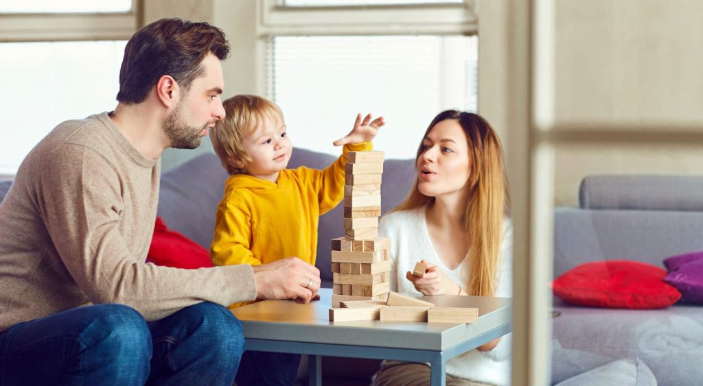Parents play with kids. Average monthly electric bill for 1 person