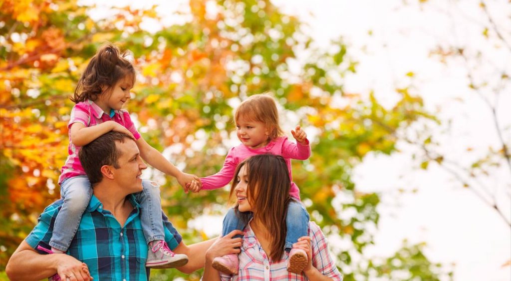 Happy family outside. Electricity Companies In Abilene