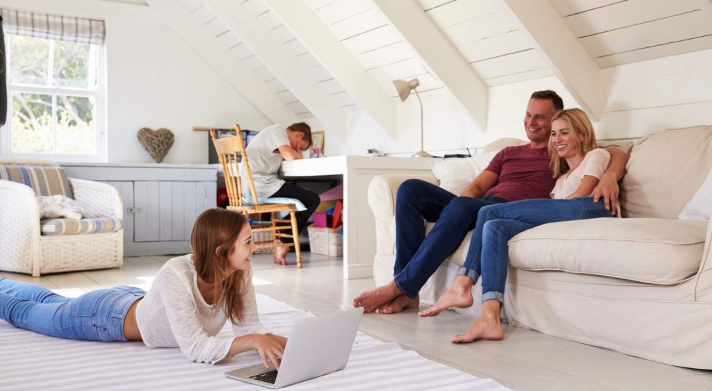 Happy family indoors - Electricity Connection Fee