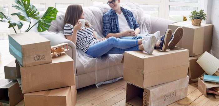 Happy family, newly moved in - Electricity For Apartments