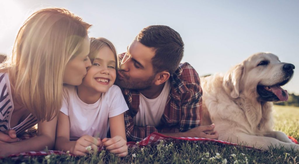 Happy family with dog - Electricity Longview Texas