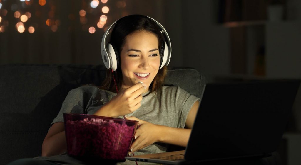 Woman watches movie - Electricity Prices