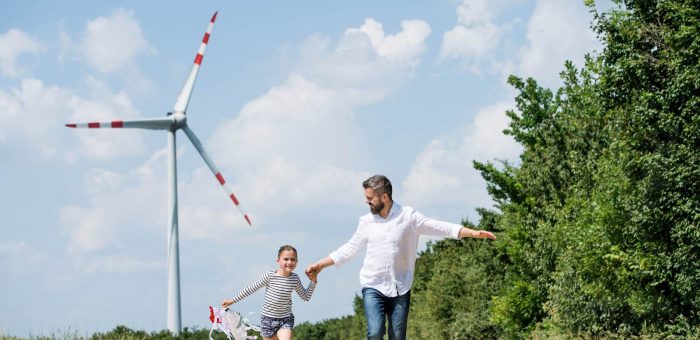 Father, daughter, windmill - Energy In Texas