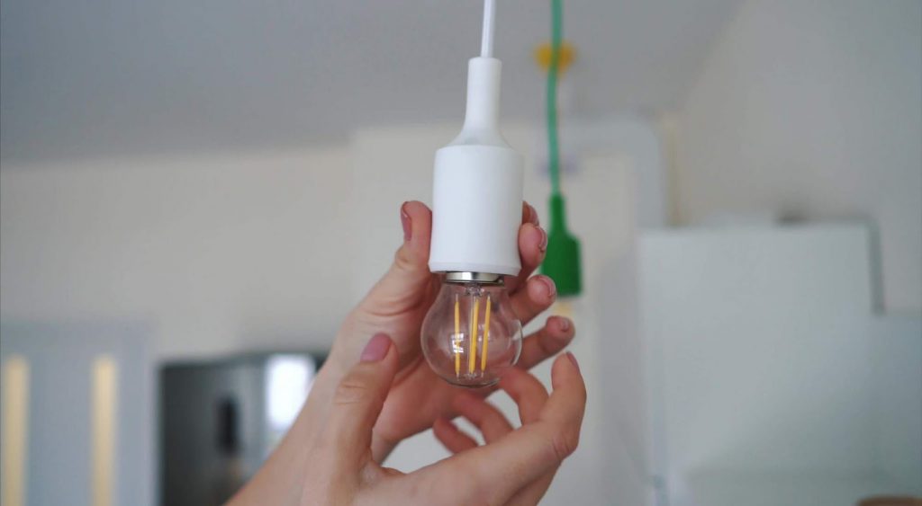 Putting in new bulb. Entrust Energy