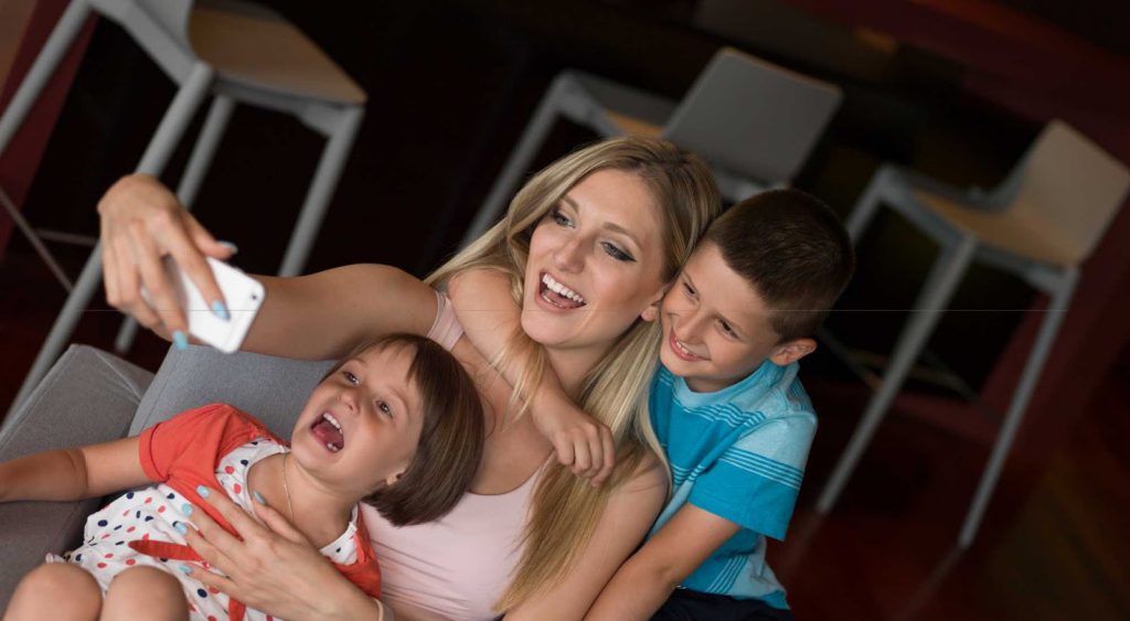 Mother and children - Fan vs Air Conditioner Electricity