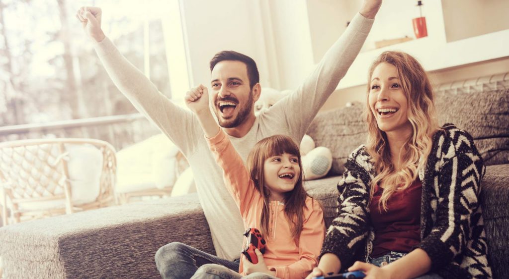 Happy family indoors. Frontier Utilities. 