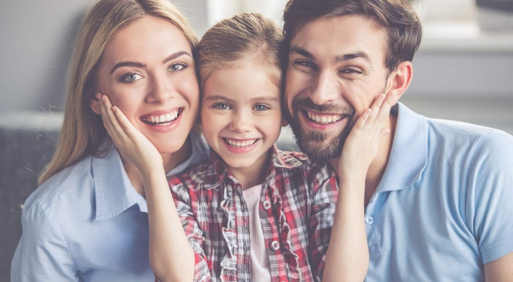 Happy family indoors. Green Energy Exchange