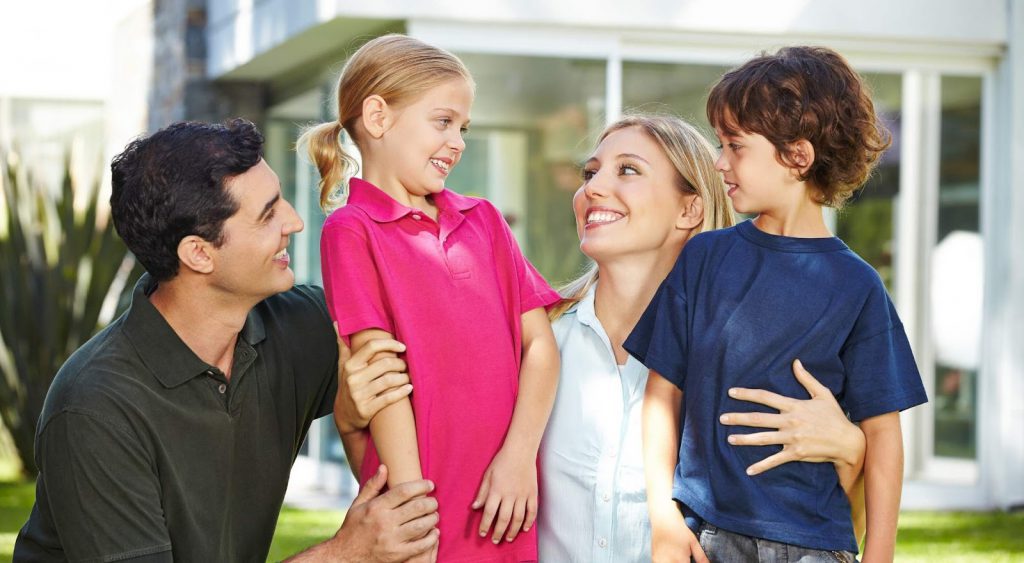 Happy family outside. Griddy Energy