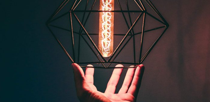 Man holding lantern - How To Get Electricity