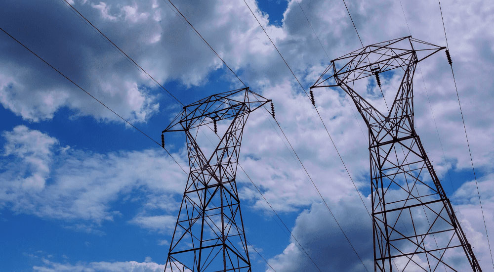 Power lines against the sky - How To Read Texas Electricity Facts Label