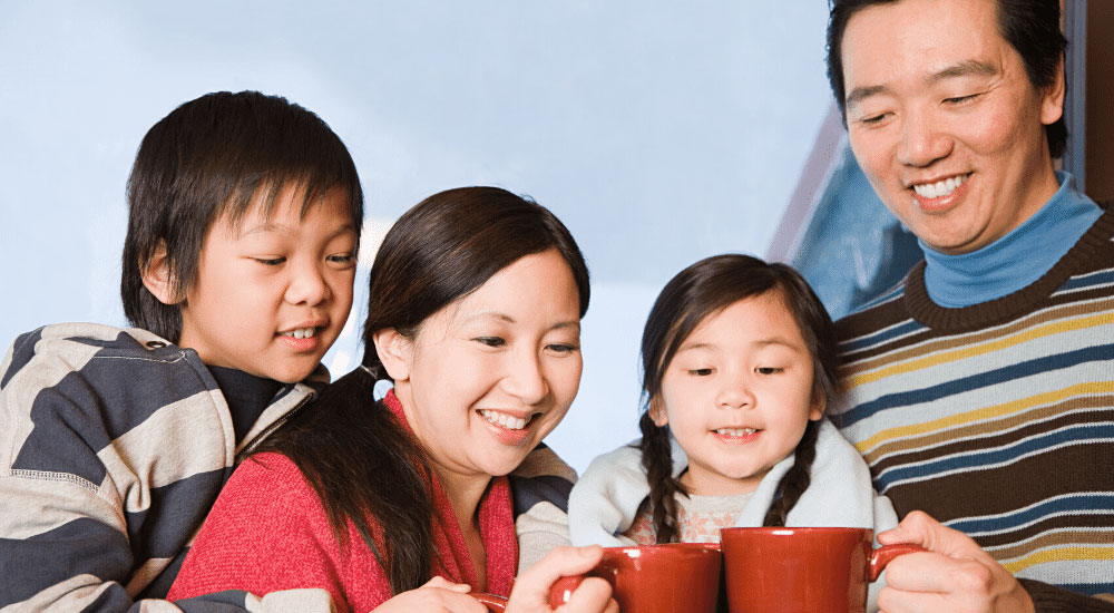 Happy family with drinks - How To Read Texas Electricity Facts Label