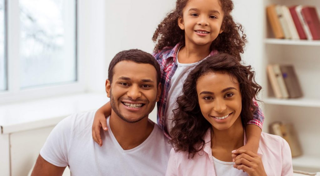 Happy family indoors. IGS Energy