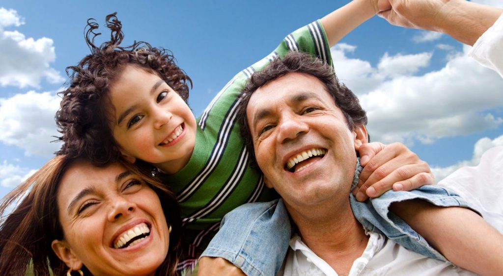 Happy family outside. Infuse Energy