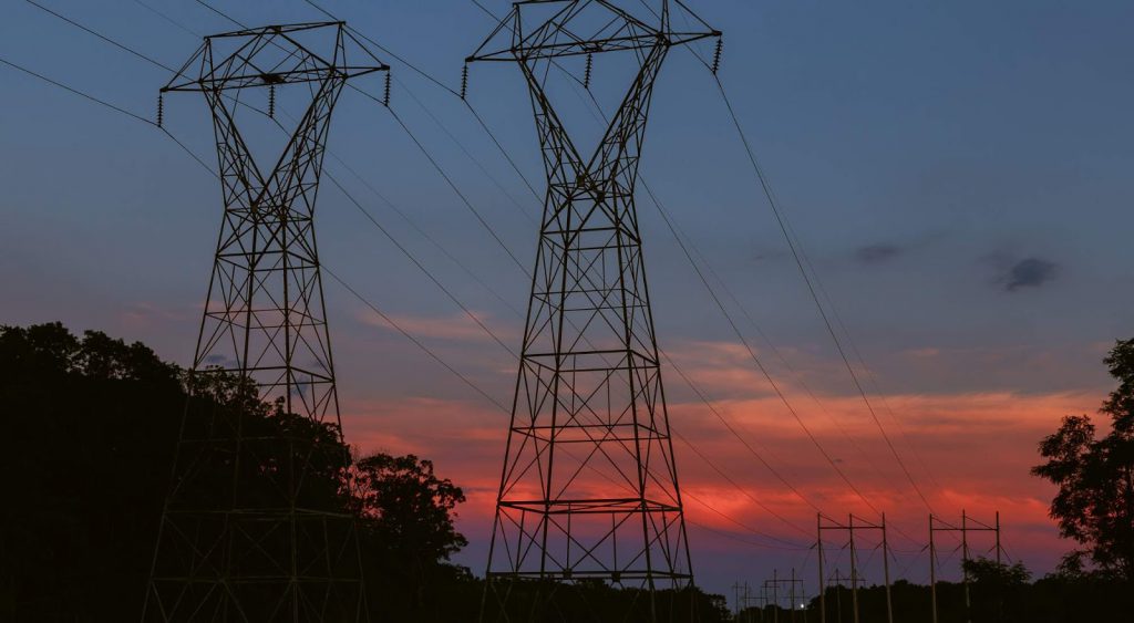 Powerlines at sunset - Is Commercial Electricity Cheaper Than Residential