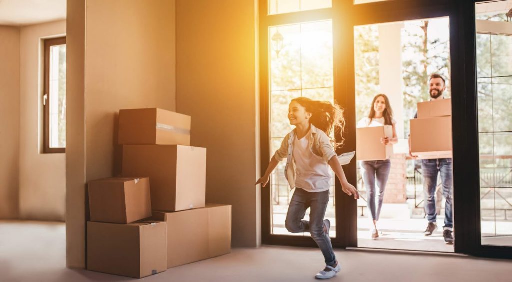 Happy family moving into new home - No Credit Check Electricity