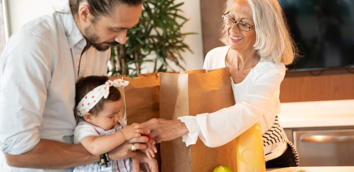 Happy family with groceries - No Deposit Electric Companies In Texas