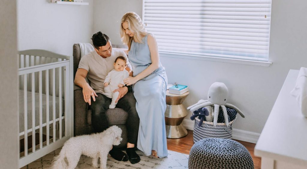 Happy couple with baby - No Deposit Electric Companies In Texas