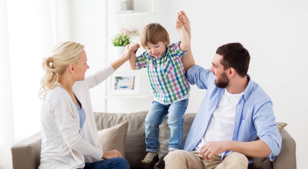 Happy family on couch - Odessa