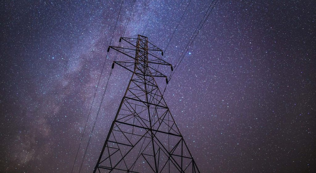 Power lines at night - TXU Energy Free Nights