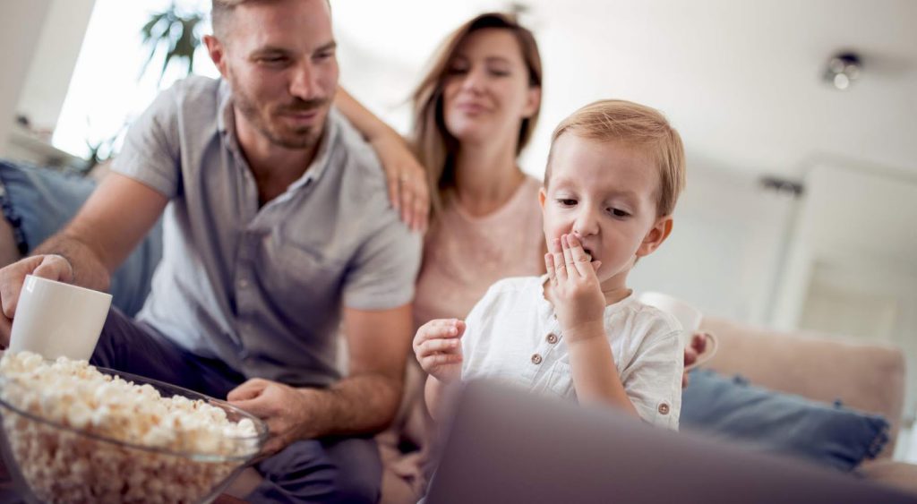 Happy family with boy - TXU Energy Free Nights