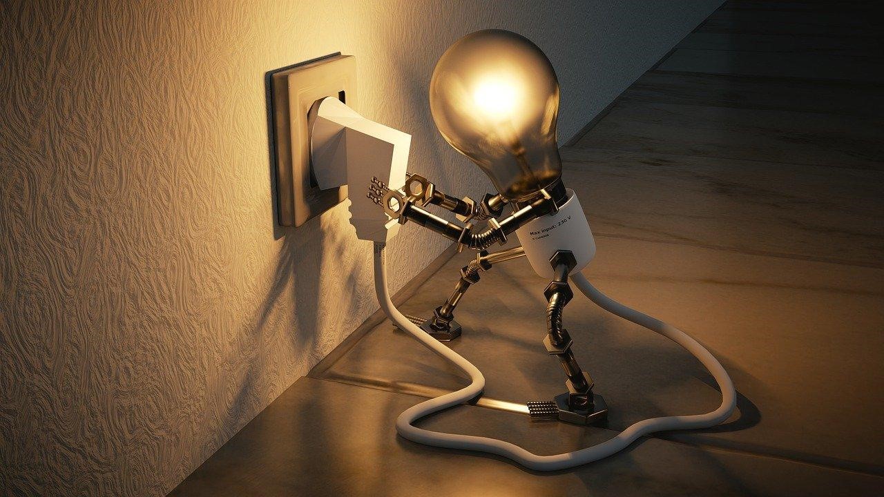 Light bulb switching outlets with a plug