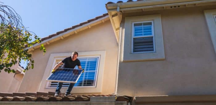 Man installing solar roof